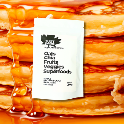 Just Proats, overnight oats package with a stack of pancakes and maple syrup in the background